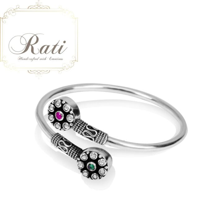 Half channel set bangle with cubic zirconia