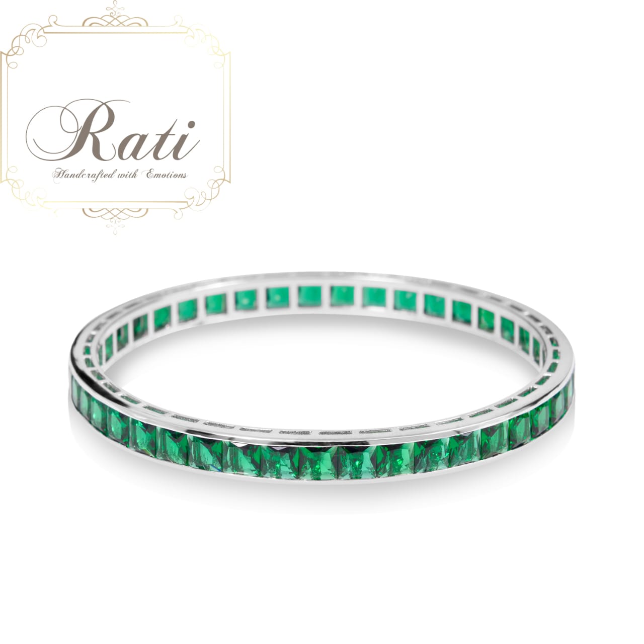 green oval channel set bangle with cubic zirconia