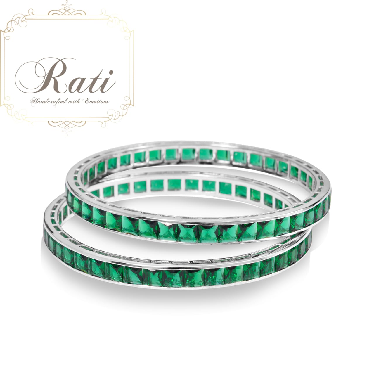 green oval channel set bangle with cubic zirconia